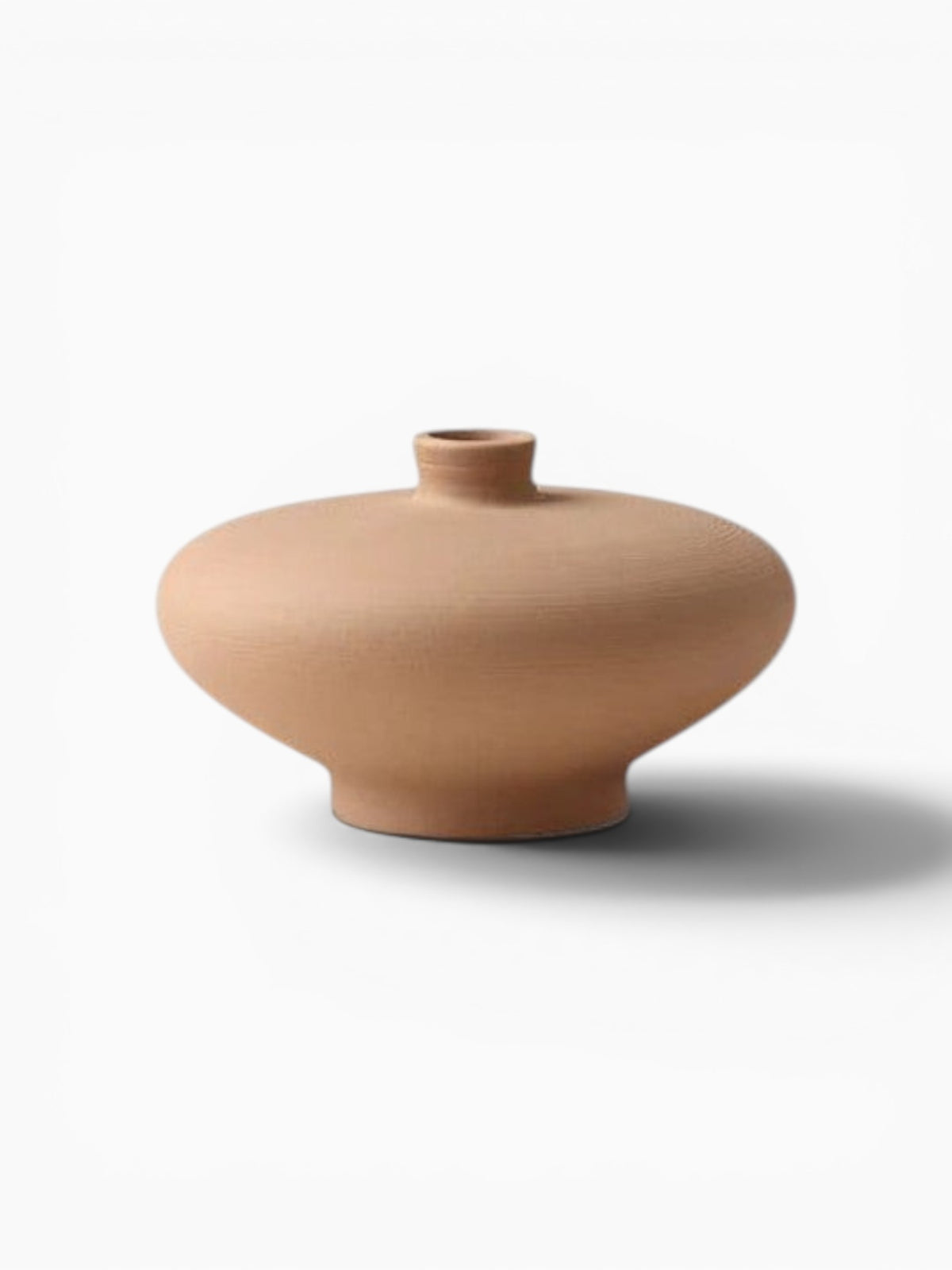 Vase Ma boutique en céramique mate, forme arrondie, couleur terre cuite, design minimaliste.