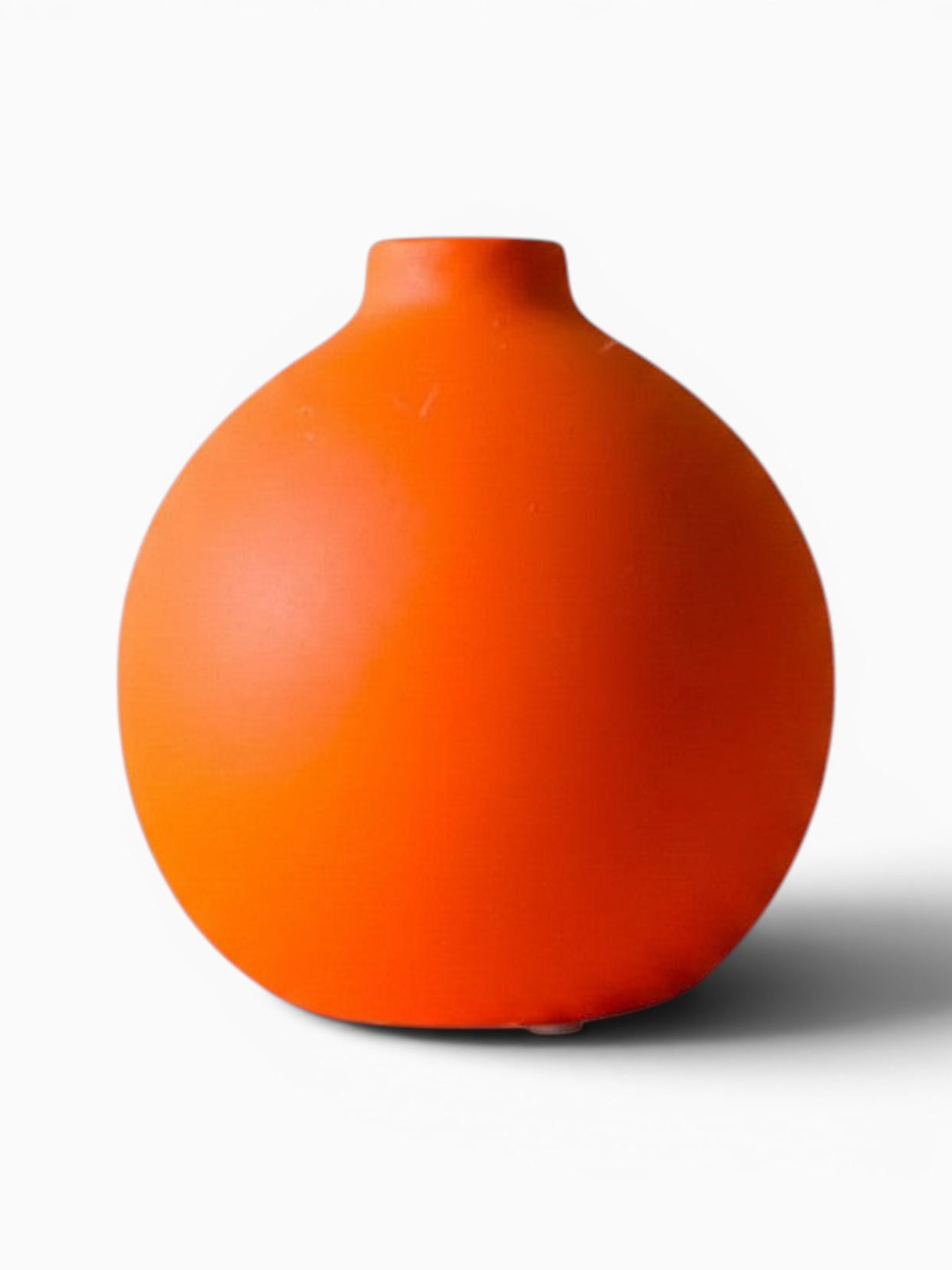 Vase en céramique orange vif Ma boutique, design moderne et minimaliste, parfait pour fleurs séchées ou comme objet décoratif.