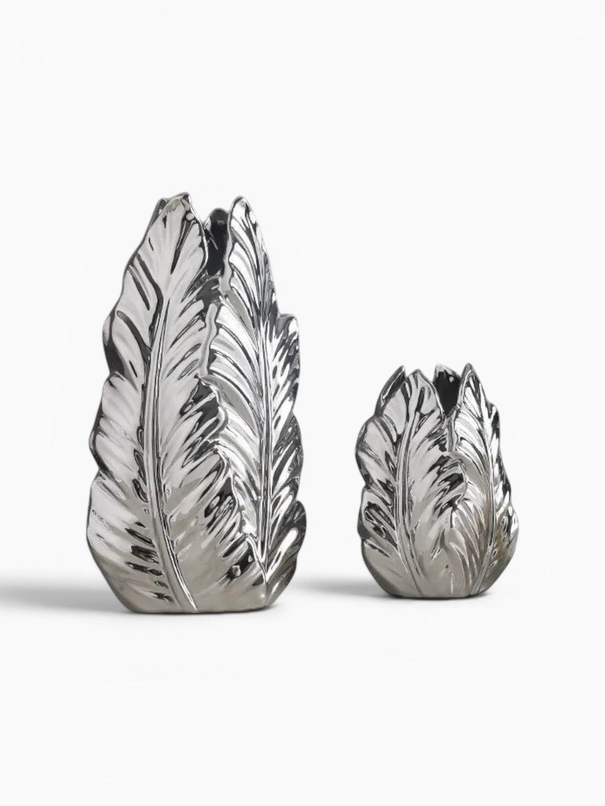 Ma boutique vase feuille en céramique argenté, design élégant pour décoration moderne et luxueuse.