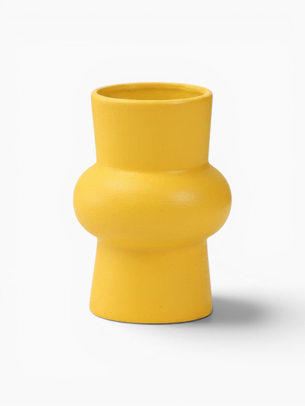 Vase Ma boutique jaune en céramique moderne, forme unique, idéal pour fleurs séchées ou comme objet décoratif.